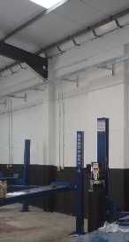 picture of an electrically operated car ramp in a tyre depot